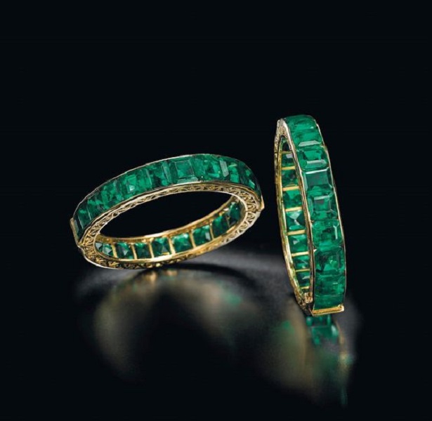 A pair of antique emerald Indian bangles 