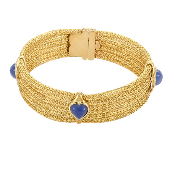 Scintillating, radiant and flamboyant, this fascinating bracelet is comprised of countless slim chains of precious 18K yellow gold to produce a mesmerizing visual effect while blue carnelian stones bring exceptional balance into the design.