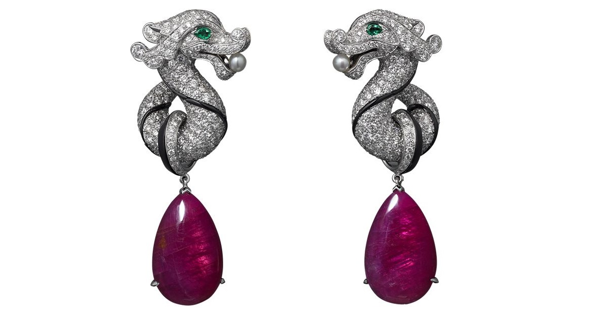 Cartier High Jewelry earrings White gold, two ruby drops totaling 21.47 carats, emerald eyes, two natural pearls, onyx, brilliants. 